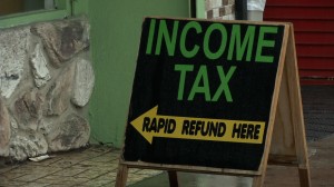 Income Tax -- Rapid Refund Here sign