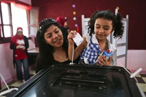 Amid low turnout, Egypt extends voting for one more day