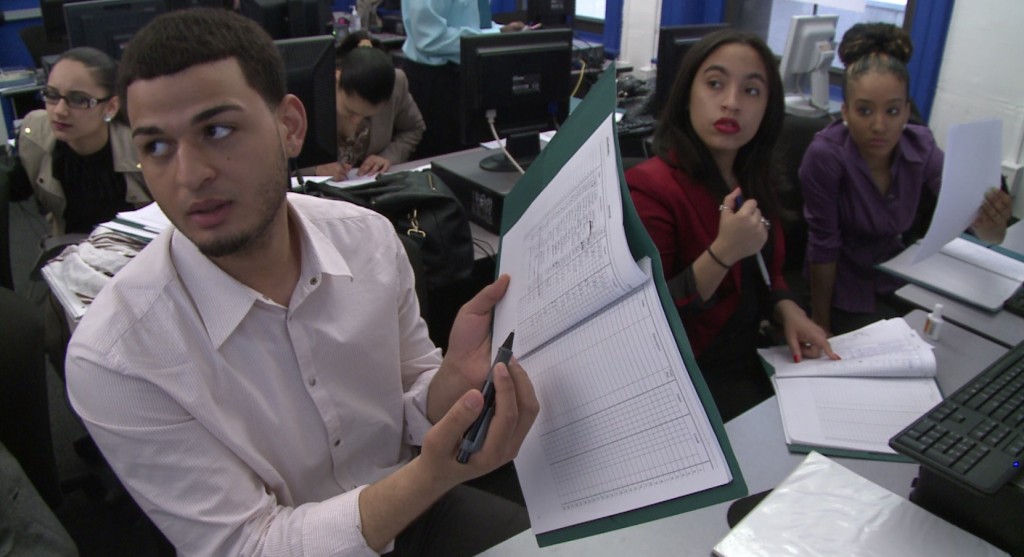 At Year Up, students not only learn hard skills like accounting, but they learn how to make eye contact when they're talking to other people, in this case, their instructors.