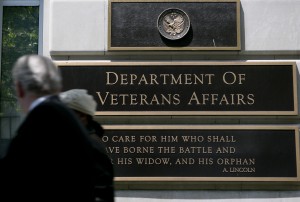 Pedestrians walk past the U.S. Department of Veterans Affairs headquarters in Washington, D.C. Photo by Andrew Harrer/Bloomberg via Getty Images