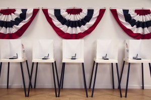 File photo of voting booths by Blend Images - Hill Street Studios and Getty Images