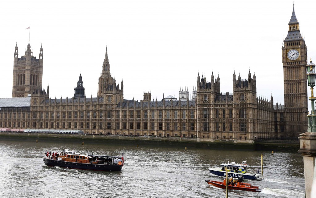 The 'Havengore' makes its way along the Thames River, marking the same route it traveled 50 years ago for Winston Churchill's funeral.