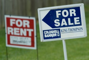 Signs advertising real estate for sale and rent sit on display at the end of a road in Columbus, Ohio, Thursday, May 18, 2006. Photo by Gary Gardiner/Bloomberg via Getty Images