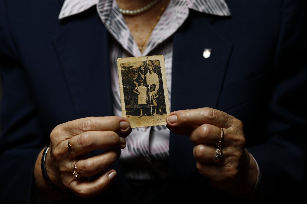 Auschwitz concentration camp survivor Maria Stroinska poses for a portrait in Warsaw