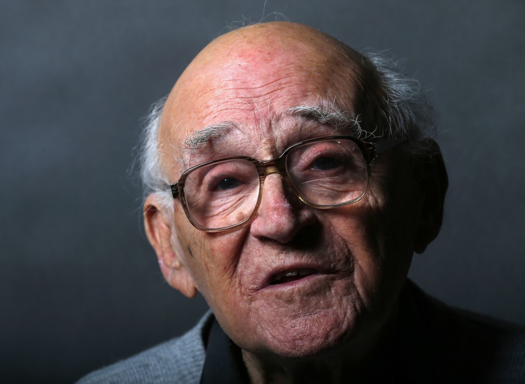 Auschwitz death camp survivor Laszlo Bernath poses for a portrait in Budapest