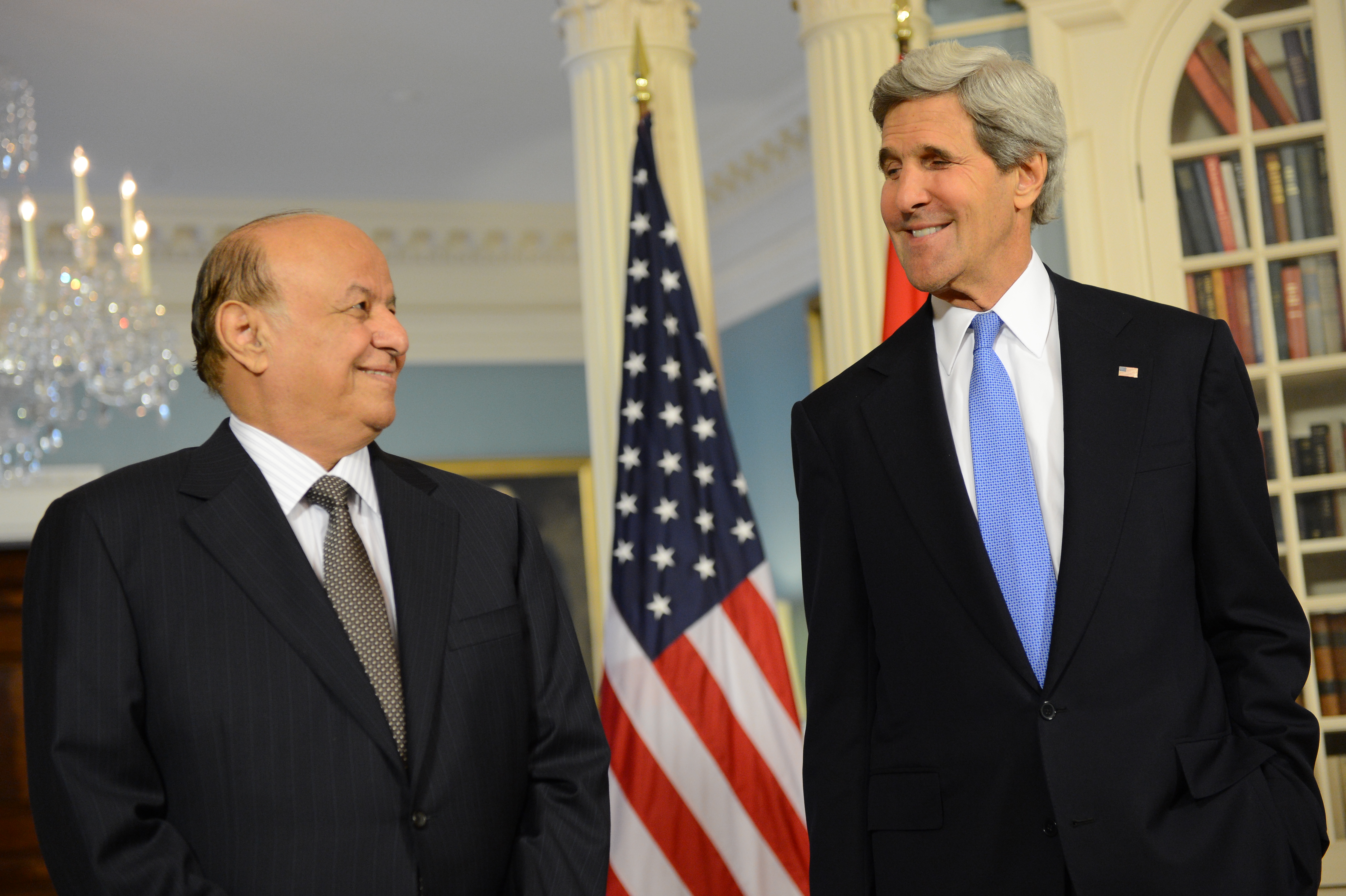 Yemen's President Abed Rabbo Mansour Hadi, pictured here with U.S. Secretary of State John Kerry, resigned his presidency on Thursday amid clashes with Shiite rebels. Photo by U.S. State Department