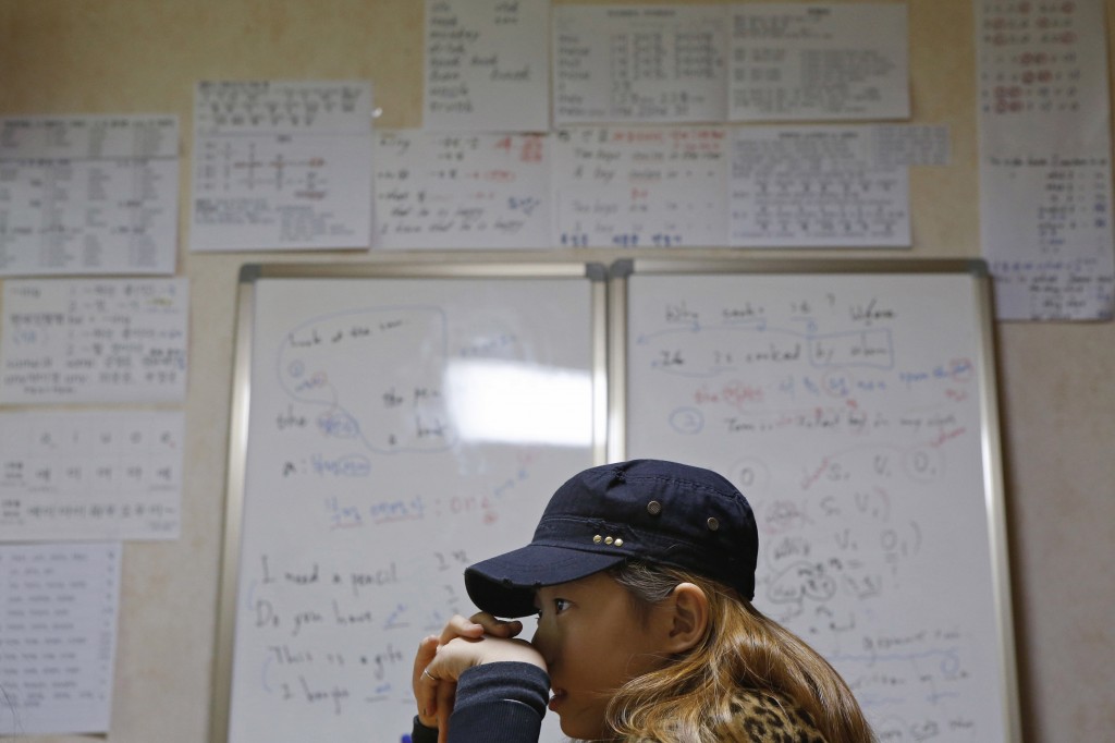 Kim Si-yoon attends a private English lesson in Seoul Nov. 20, 2014. Photo by Kim Hong-Ji/Reuters