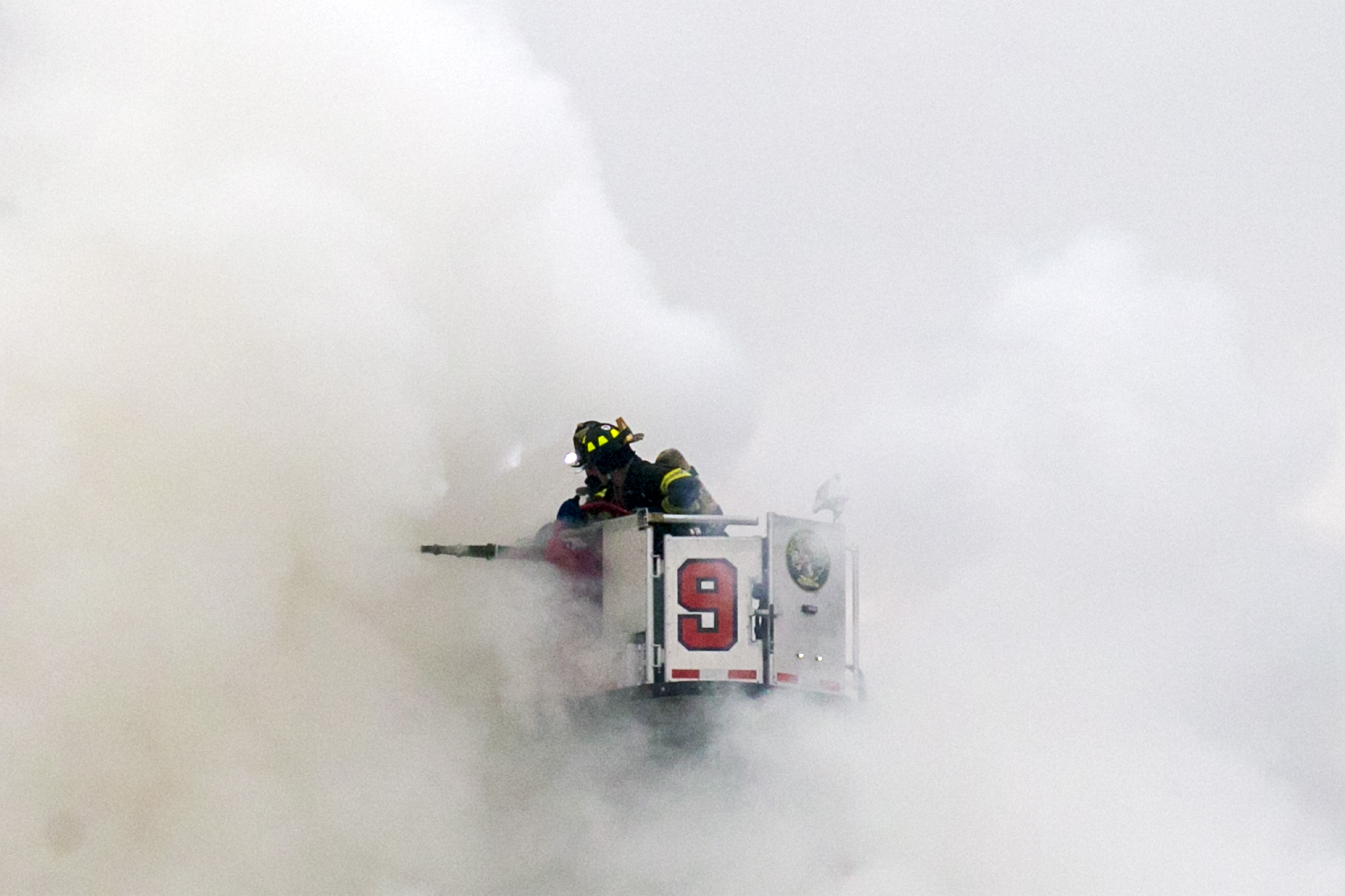 New York City Fire Department firefighters battle fire at the site of a residential apartment building collapse and fire in New York City's East Village neighborhood, March 26, 2015. Photo by Brendan McDermid/Reuters