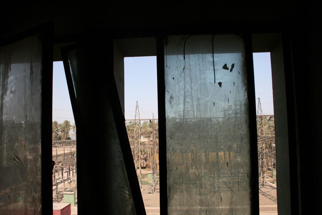 Window to the Yard Through dilapidated windows is a view of the plant's switchyard. All photos by Larisa Epatko