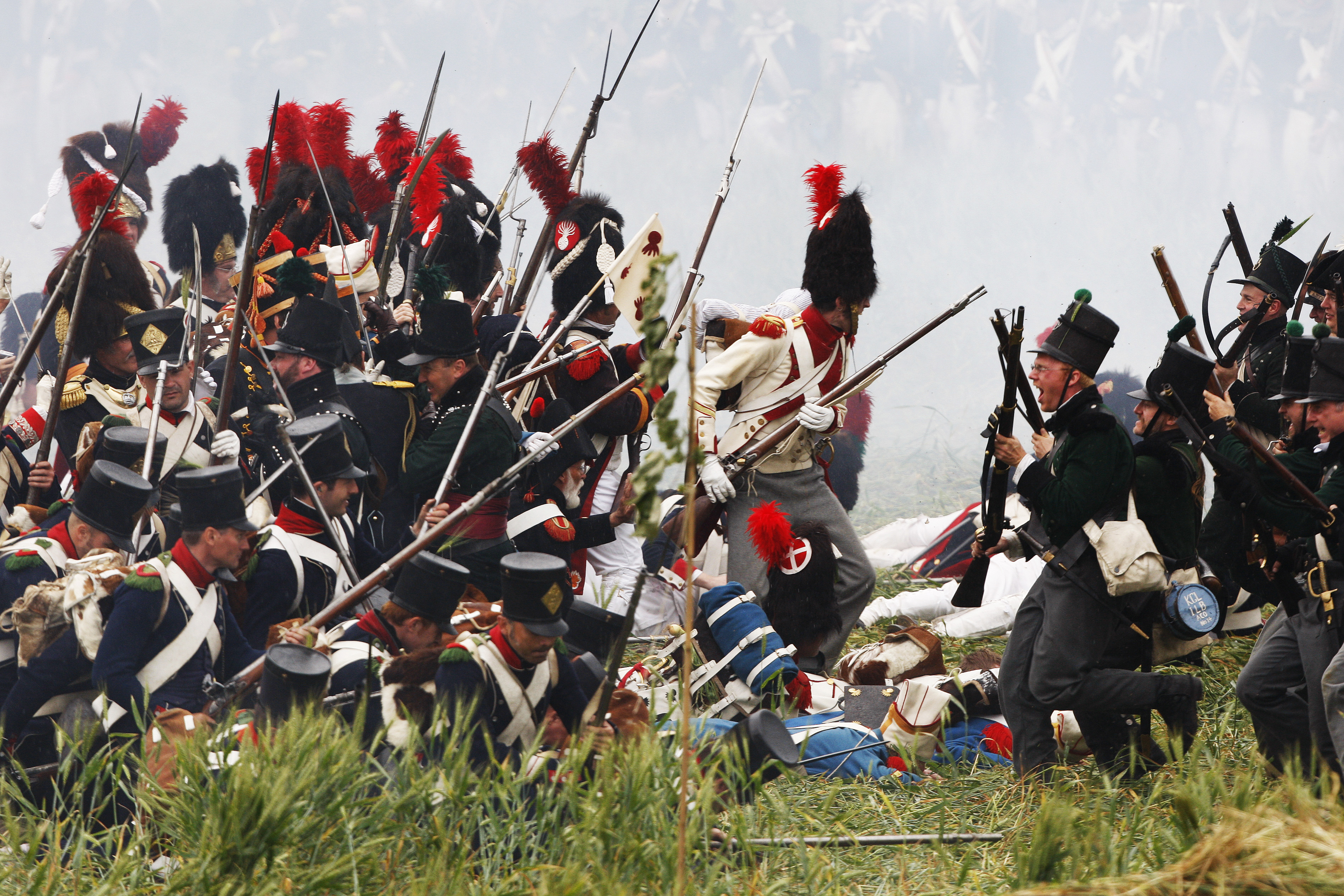 History enthusiasts, dressed as members of the French and British Army, fight during a re-enactment of Napoleon's famous battle of Waterloo in Braine-l'Alleud June 21, 2009. 2015 marks the 200th anniversary of the decisive battle. Credit: Thierry Roge/REUTERS