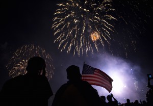 Spectators watch the Macy's Fourth of July fireworks explode over the East River in New York, July 4, 2014. New studies show that fireworks may adversely affect peoples' health because of the high levels of pollutants they release into the air. Photo by Eric Thayer/Reuters