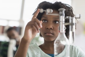 Student doing experiment in science lab