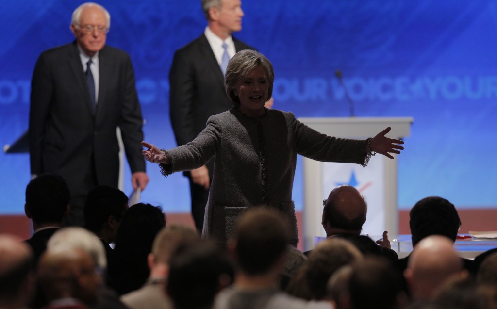 Democratic presidential candidate Hillary Clinton reacts to supporters at the end of Saturday's debate. Photo By Brian Snyder/Reuters. 