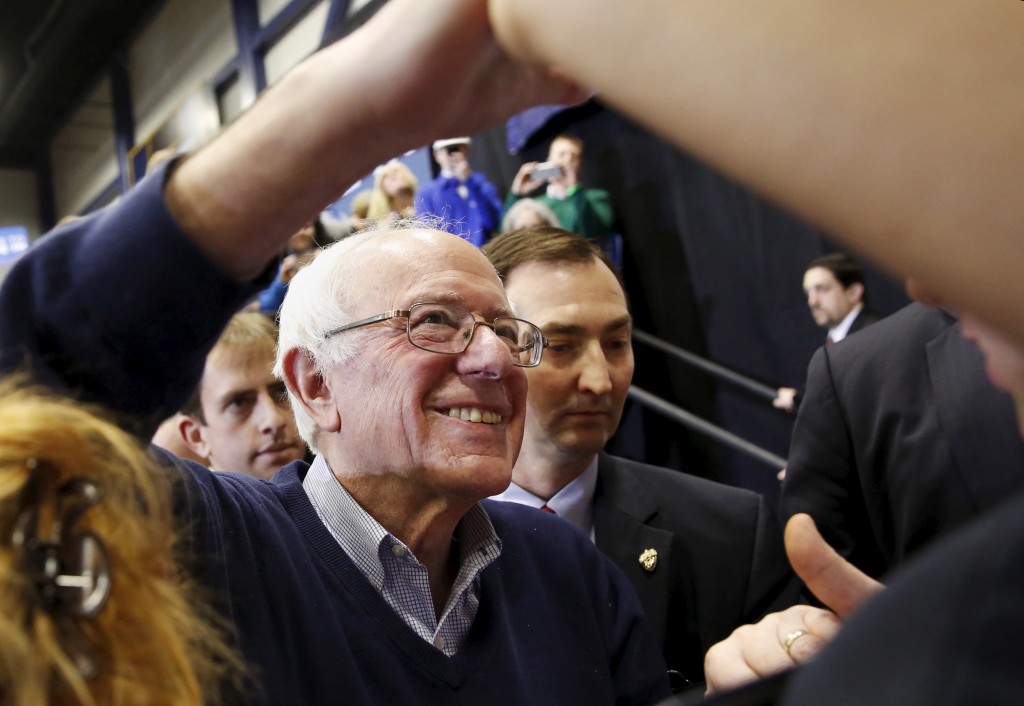 Democratic U.S. presidential candidate Bernie Sanders shakes hands with supporters during a rally at Great Bay Community College in Portsmouth, New Hampshire February 7, 2016.    Shannon Stapleton/Reuters 