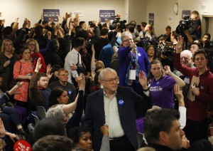 People participate in the Democratic caucus at the Iowa State Historical Society in Des Moines, Iowa on Monday. Photo by Brian C. Frank/Reuters