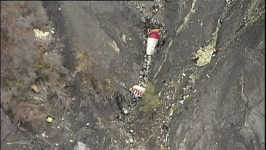 Debris from an Airbus A320 is seen in the mountains, near Seyne-les-Alpes, March 24, 2015 in this still image taken from TV. The Airbus operated by Lufthansa's Germanwings budget airline crashed into a mountainside in the French Alps on Tuesday, killing all 150 people on board including 16 schoolchildren. REUTERS via Reuters TV/Pool TPX IMAGES OF THE DAY - RTR4UQ0I