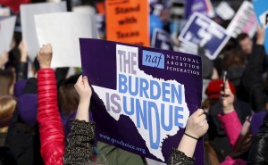 Protesters demonstrated in front of the U.S. Supreme Court on March 2, 2016 as the court weighed whether a Texas law that imposes strict regulations on abortion doctors and clinic buildings interferes with the constitutional right of a woman to end her pregnancy. Photo by Kevin Lamarque/Reuters