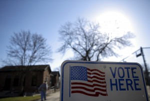 A voter arrives to cast their ballot in the Wisconsin presidential primary election at a voting station in Milwaukee, Wisconsin, United States, April 5, 2016. REUTERS/Jim Young - RTSDPNC