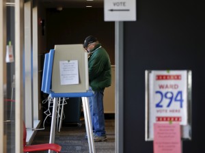 A voter casts his ballot at the Tippecanoe Library during voting for the Wisconsin U.S. presidential primary election in Milwaukee April 5, 2016. REUTERS/Kamil Krzaczynski - RTSDPOO