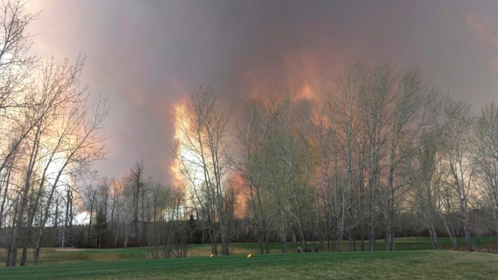 A wildfire is seen from MacDonald Island Park near Fort McMurray, Alberta, Canada on May 3, 2016. Photo courtesy of Kangeun Lee/Handout via Reuters