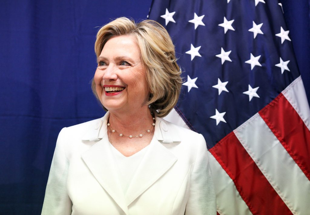 U.S. Democratic presidential candidate Hillary Clinton smiles before holding a roundtable on healthcare in San Juan, Puerto Rico, September 4, 2015. Clinton is campaigning in Puerto Rico the same day that Republican contender Marco Rubio is visiting. While Puerto Rico's residents will not be eligible to cast presidential votes in November 2016, they have a voice in the primaries and, as the island's economy has suffered, an increasing number have moved to U.S. states where they can vote, particularly Florida. REUTERS/Alvin Baez - RTX1R6G4