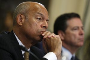 U.S. Homeland Security Secretary Jeh Johnson (L) and FBI Director James Comey listen to opening remarks during a House Homeland Security Committee hearing on Capitol Hill in Washington, U.S., July 14, 2016. REUTERS/Jonathan Ernst - RTSHXCW
