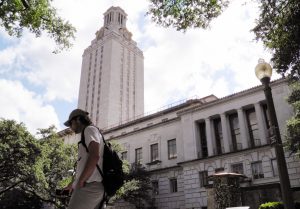 A student walks through the University of Texas campus in Austin. Photo by Jon Herskovitz/Reuters