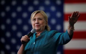 Clinton knocks 'outlandish Trumpian ideas' in policy speech