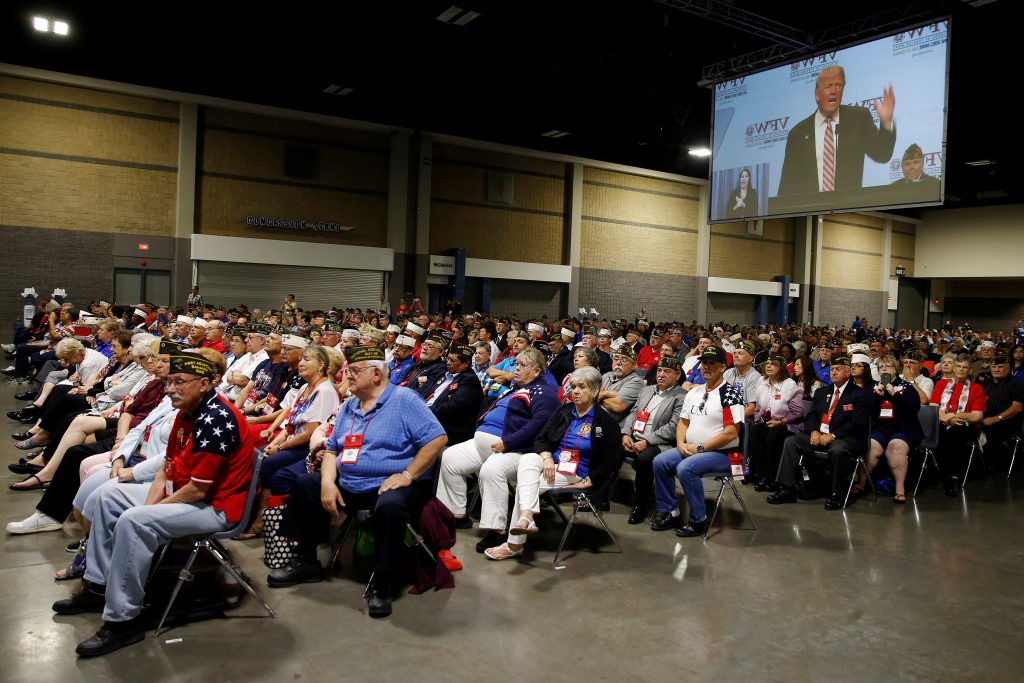 An image of Republican presidential nominee Donald Trump appears on a screen as he speaks to the Veterans of Foreign Wars conference at a campaign event in Charlotte, North Carolina in July. Photo by Carlo Allegri/Reuters