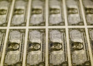 United States one dollar bills seen on a light table at the Bureau of Engraving and Printing in Washington