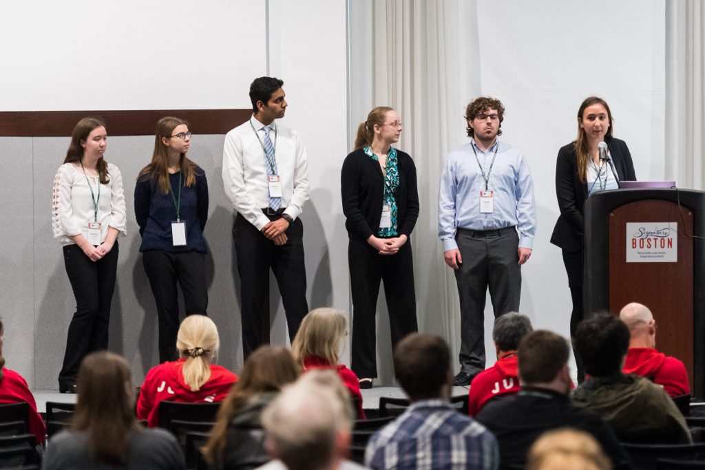 Students from the University of Minnesota present their project at the iGEM competition in Boston. From left to right, Kathryn Almquist, Carolyn Domroese, Ajinkya Limkar, Sarah Lucas, Chase Bowen, and Sophie Vrba. Photo by Justin Knight/IGEM Foundation