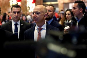 Jeff Bezos, founder, chairman, and chief executive officer of Amazon.com enters Trump Tower ahead of a meeting of technology leaders with President-elect Donald Trump in Manhattan, New York City. Photo by Andrew Kelly/Reuters