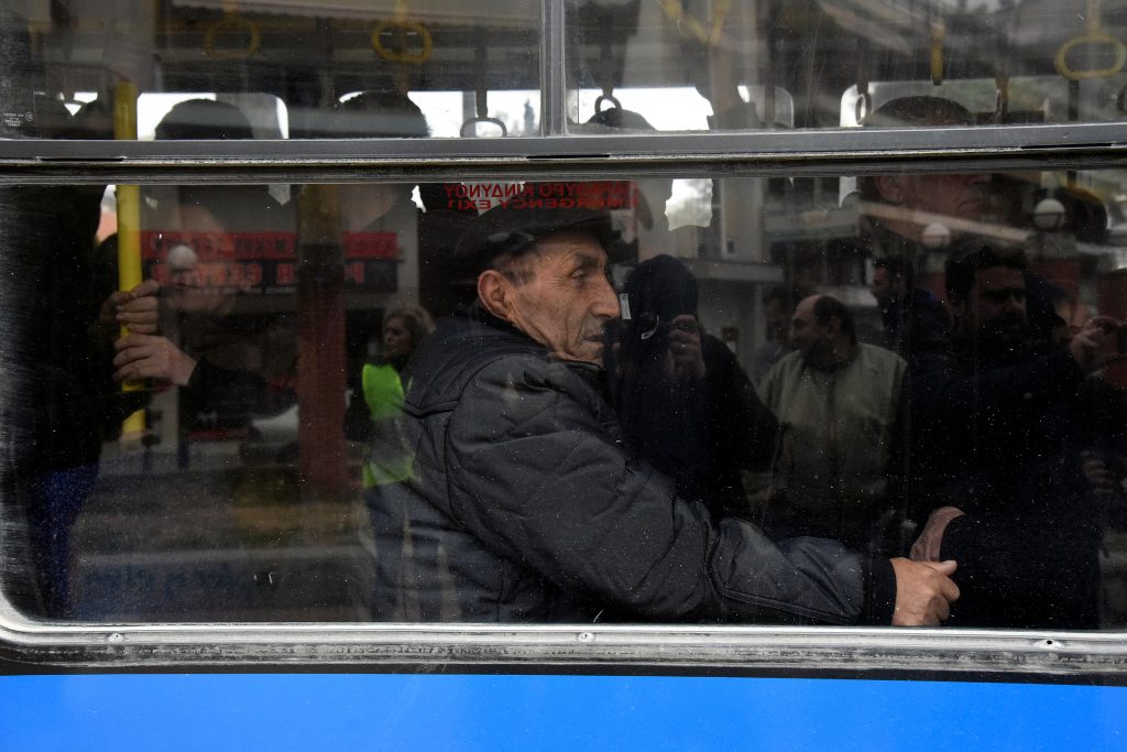 People are transferred according to an evacuation plan, before an operation to defuse a 250 kg World War Two bomb found during excavation works at a gas station on the northern city of Thessaloniki, Greece, February 12, 2017.  REUTERS/Alexandros Avramidis - RTSY8VP