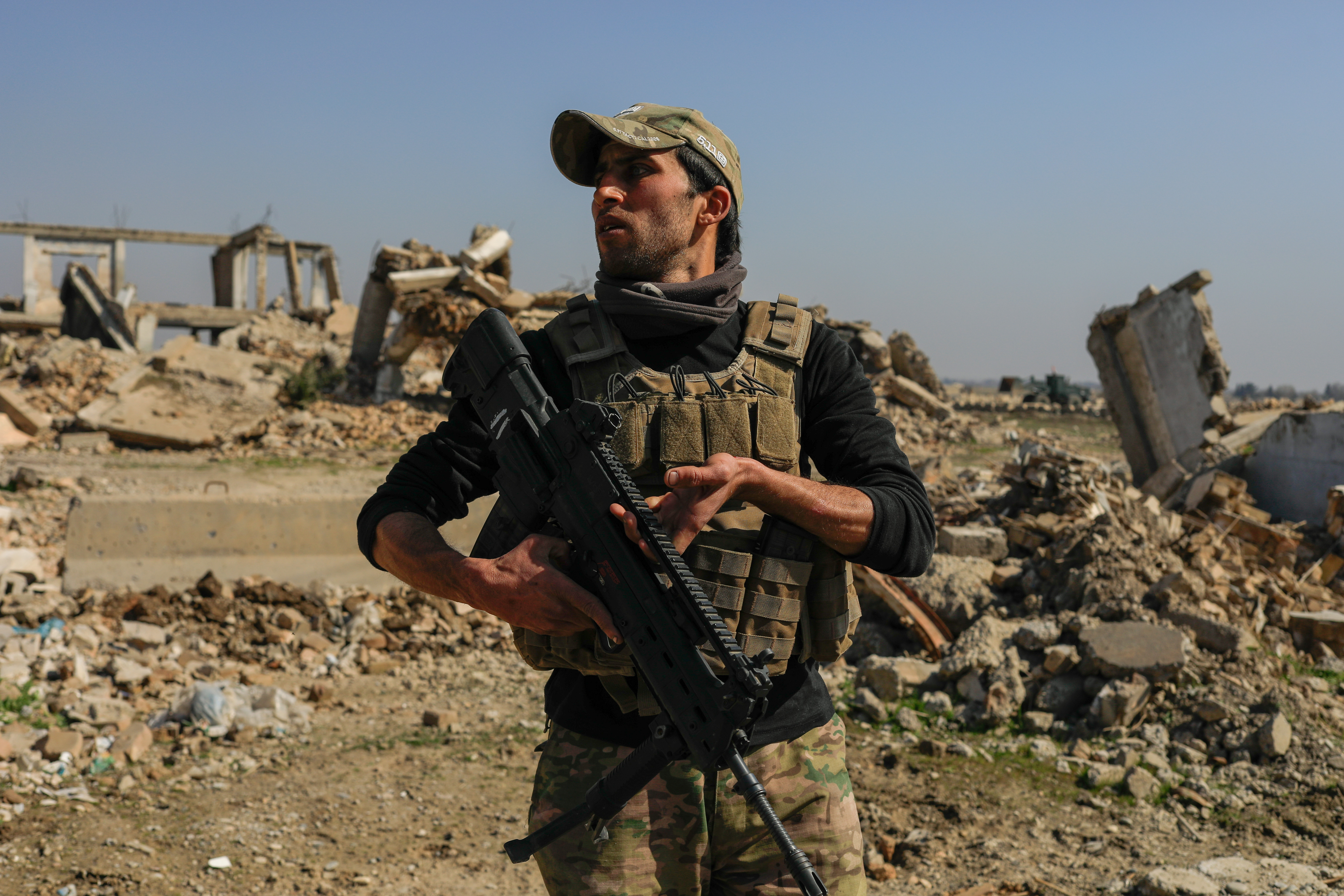 An Iraqi security forces member is pictured beside a destroyed airport building in Mosul after driving out Islamic State's militants. Photo by Zohra Bensemra/Reuters