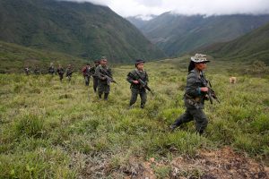 Members of the 51st Front of the Revolutionary Armed Forces of Colombia (FARC) patrol in the remote mountains of Colombia, August 16, 2016. Picture taken August 16, 2016. Photo By John Vizcaino Reuters