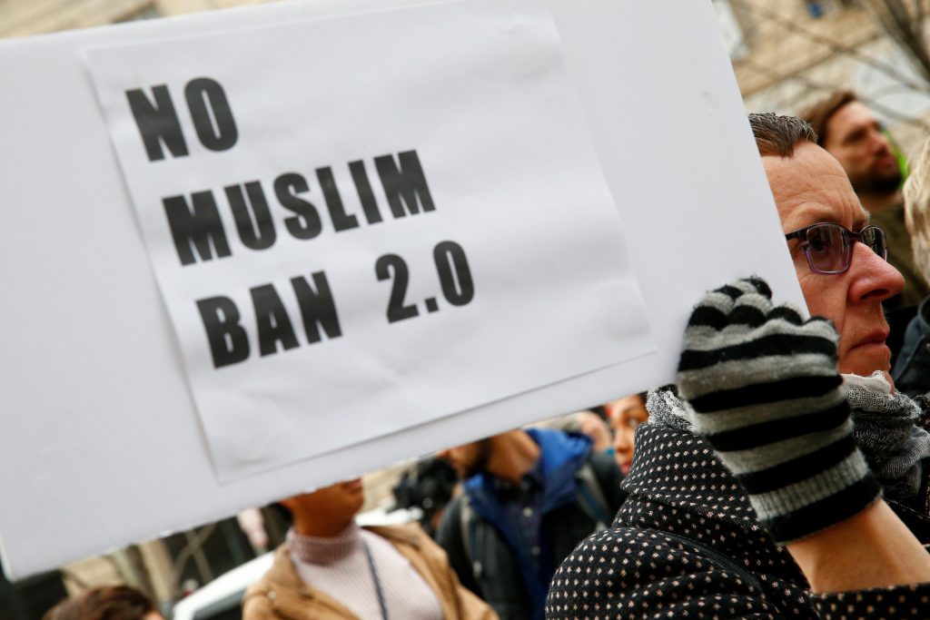 Immigration activists rally outside of the U.S. Customs and Border Protection headquarters in Washington