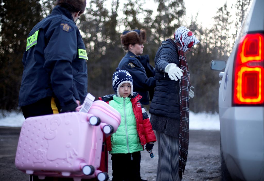 A family that claimed to be from Turkey is arrested after crossing illegally into Canada from the U.S. Photo by Christinne...