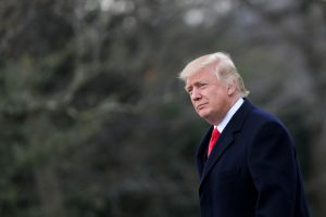 U.S. President Donald Trump walks on the South Lawn of the White House before his departure to Louisville, Kentucky, in Washington U.S.