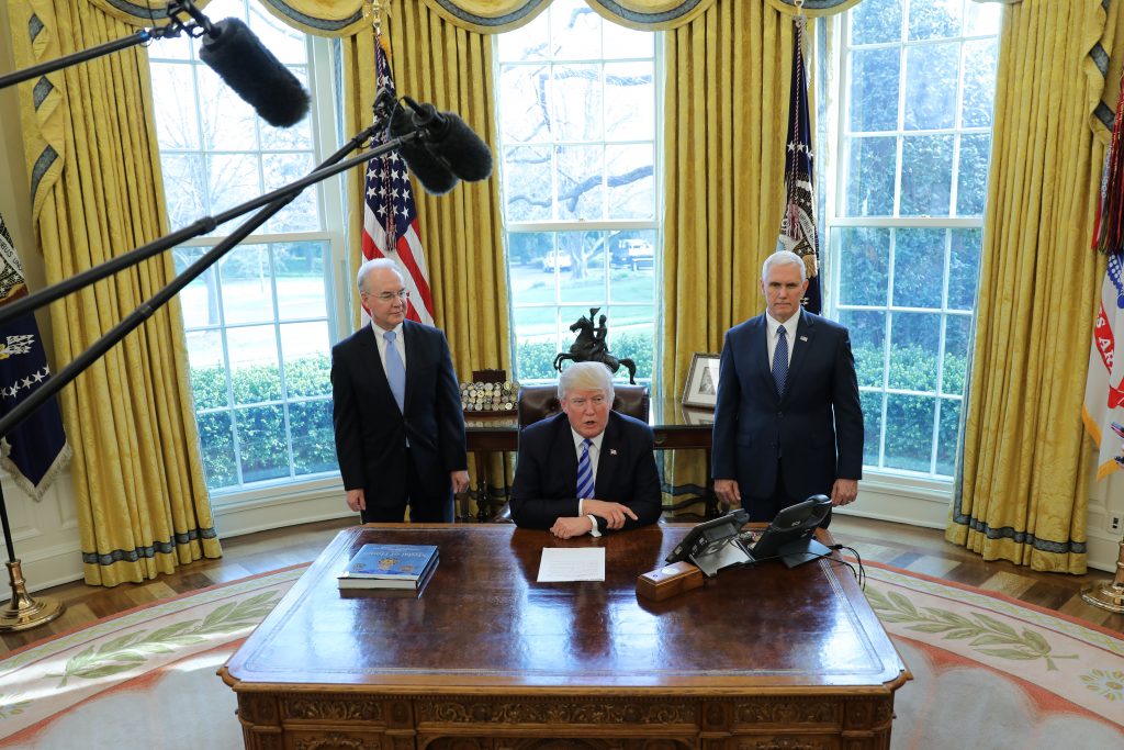 President Donald Trump talks to journalists at the Oval Office of the White House after the AHCA health care bill was pull...