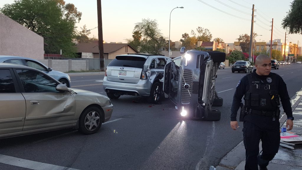 A self-driven Volvo SUV owned and operated by Uber Technologies Inc. is flipped on its side after a collision in Tempe, Ar...