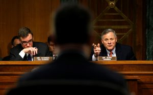 Senate Intelligence Committee Chairman Sen. Richard Burr, R, (R-NC) and ranking Democrat Sen. Mark Warner, L, (D-VA) hold a committee hearing titled "Disinformation: A Primer in Russian Active Measures and Influence Campaigns" at the U.S. Capitol in Washington, U.S., March 30, 2017. REUTERS/Kevin Lamarque TPX IMAGES OF THE DAY - RTX33E50