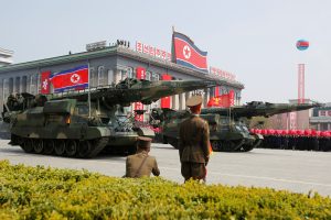 Missiles are driven past the stand with North Korean leader Kim Jong Un and other high ranking officials during a military parade marking the 105th birth anniversary of North Korea's founding father, Kim Il Sung, in Pyongyang, April 15, 2017. Photo By Sue-Lin Wong/Reuters