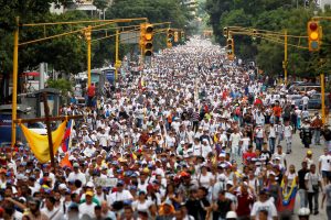 Demonstrators take part in a rally to honour victims of violence during a protest against Venezuela's President Nicolas Maduro's government in Caracas