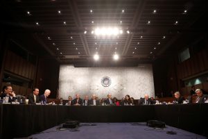 Members of the Senate Judiciary Committee cast their votes to advance Judge Neil Grouch's nomination to the Supreme Court to the Senate floor on Capitol Hill in Washington, D.C., U.S., April 3, 2017. REUTERS/Aaron P. Bernstein - RTX33X7G