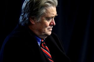 FILE PHOTO: White House Senior Advisor Steve Bannon attends a roundtable discussion held by U.S. President Donald Trump with auto industry leaders at the American Center for Mobility in Ypsilanti Township, Michigan, U.S., March 15, 2017. REUTERS/Jonathan Ernst/File Photo - RTX348IY