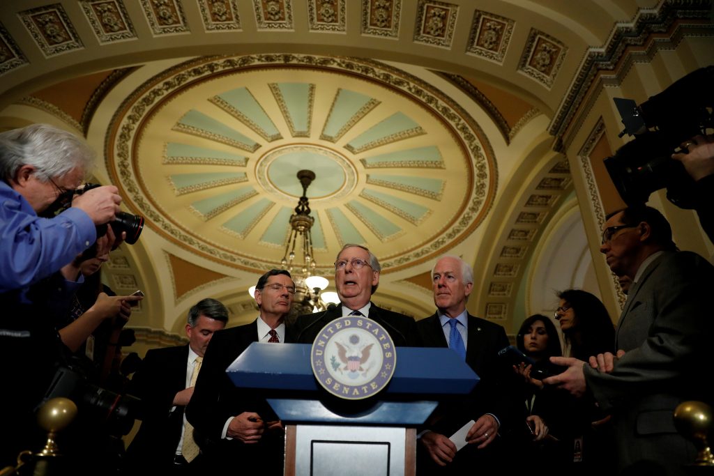 FILE PHOTO - Senate Majority Leader Mitch McConnell speaks with the media following the Republican policy luncheon on Capi...