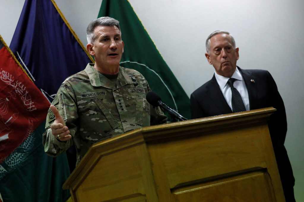 U.S. Defense Secretary James Mattis (R) and U.S. Army General John Nicholson (L), commander of U.S. Forces Afghanistan, ho...