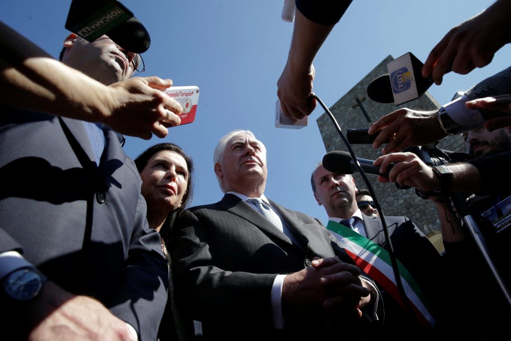 U.S. Secretary of State Rex Tillerson, (C) talks to reporters April 10 during a ceremony he attended with other G7 leaders...