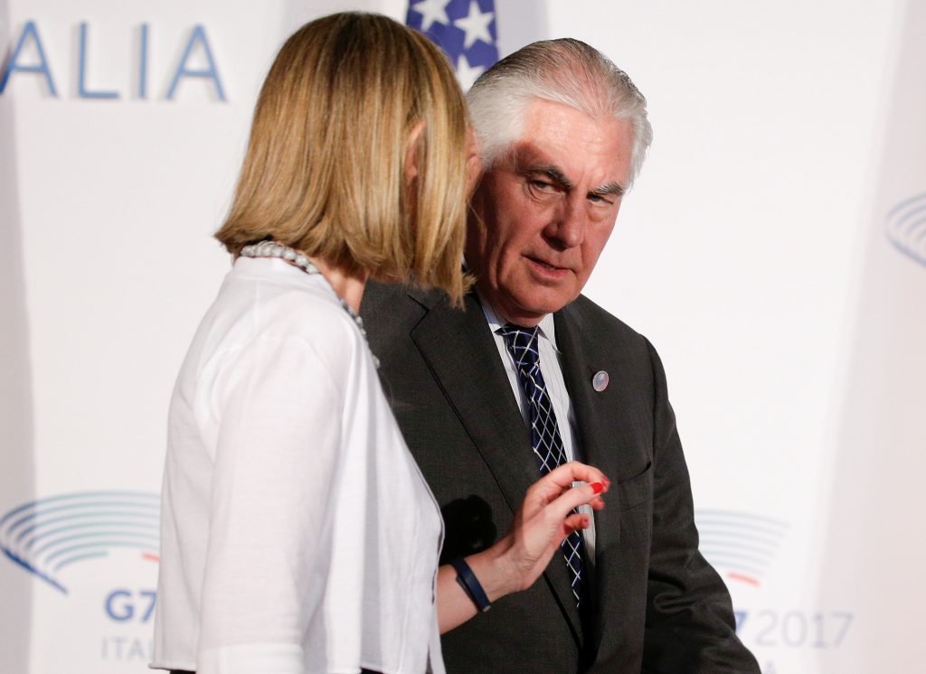 U.S. Secretary of State Rex Tillerson talks with E.U. High Representative for Foreign Affairs Federica Mogherini as they a...
