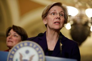 Warren 'troubled' by report of Wall Street-paid Obama speech